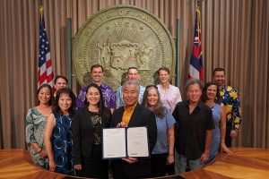 Signing ceremony, ACT 183 SLH 2022, authorizing Commercial Property Assessed Financing in Hawaii.
